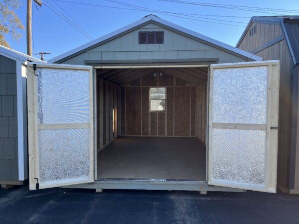 Outside 10 x 16 shed with double doors open