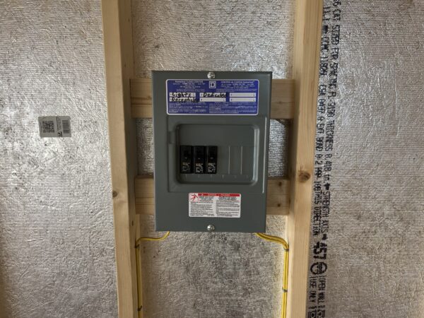 A Frame Garage interior photo of professional electrical package