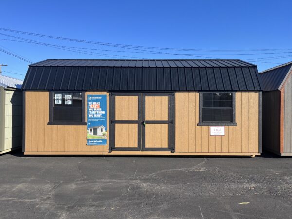 Lofted Shed 12 x 24 with double doors and two windows on the side