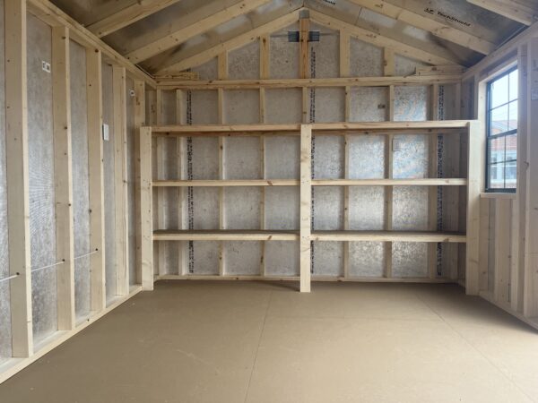 Inside of 10 x 16 shed with shelving.